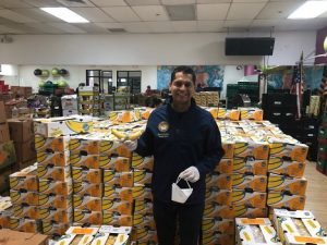 Miguel-Santiago-Chairman-of-the-Communications-and-Conveyance-Committee-of-the-California-State-Assembly-with-Chiquita-Donation-to-YMCA-7.jpg